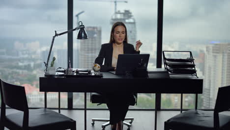 Businesswoman-video-chatting-on-laptop