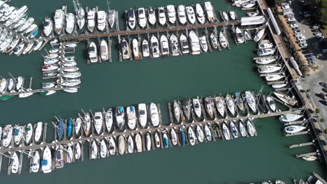 drone shot of boats in the harbor in sausalito outside of san francisco