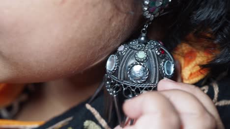 close up of a decorative ethnic earring