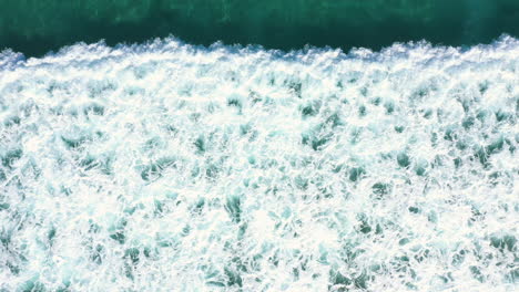 4k-Drone-shot-of-blue-turquoise-ocean-wave-break-in-the-sea
