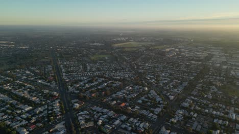 Aerial-flyover-Geelong-City-during-sunset-time-in-Victoria-State-of-Australia