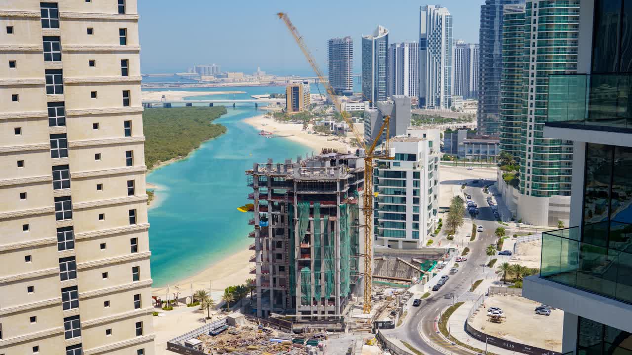 Waterfront construction project on Al Reem Island in Abu Dhabi, United Arab Emirates - time lapse