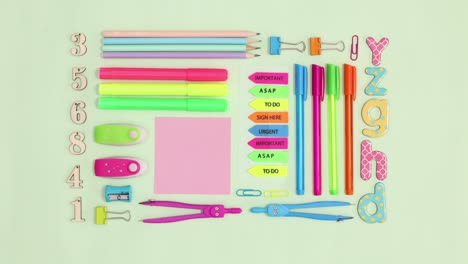 back to school stationery making creative layout on green theme. stop motion