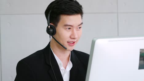 business people wearing headset working in office