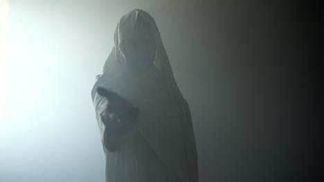 jesus christ in glowing, abstract, bright light, offering his hand for help, salvation, love, forgiveness. cinematic, slow motion christian visual representation of easter resurrection and the gospel.