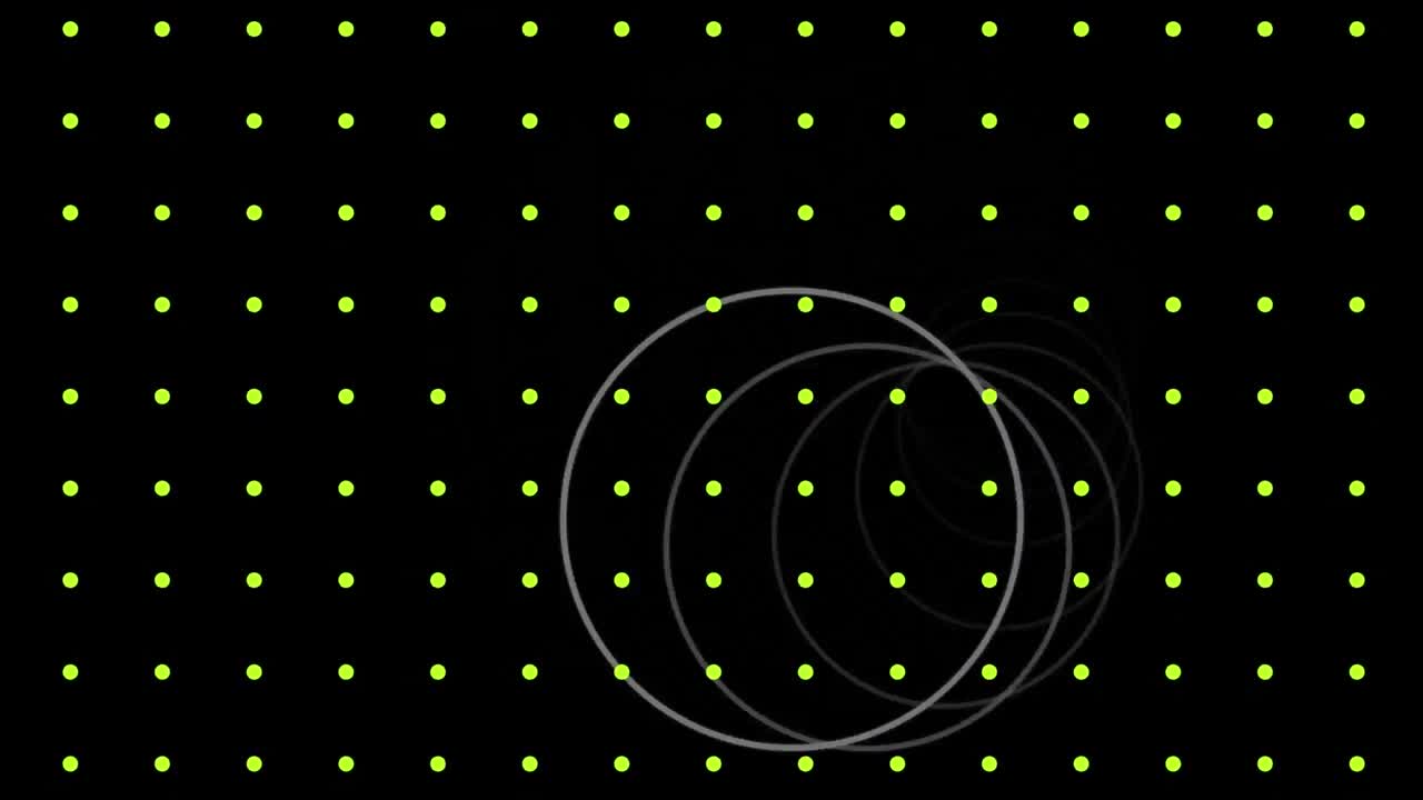 검은색 배경에 박동하는 노란색 점의 격자 위에 움직이는  ⁇ 색 고리의 애니메이션