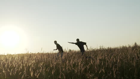 men celebrating in a field