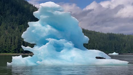 A-Harbor-Seal-Relaxes-On-An-Iceberg-In-Alaska'S-Laconte-Bay