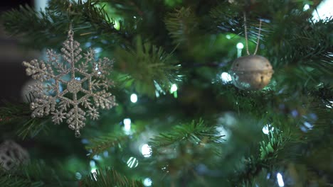 Close-up-of-Snow-flake-ornament-decoration-on-a-Christmas-tree