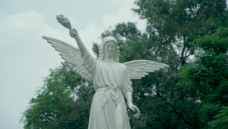 various statues in the park inside bandel church