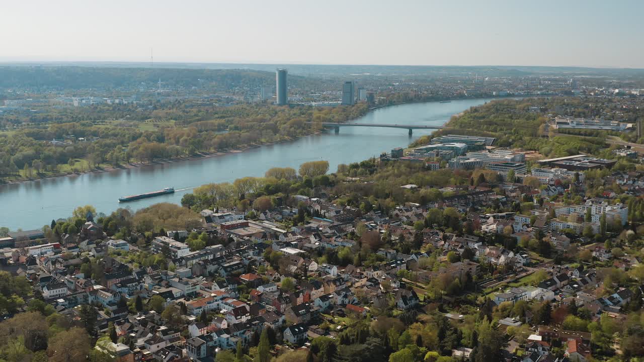 Drone - Aerial panorama shot bonn with the konrad adenauer bridge, the river rhine with a ship, the Kameha Grand hotel and the post tower 25p