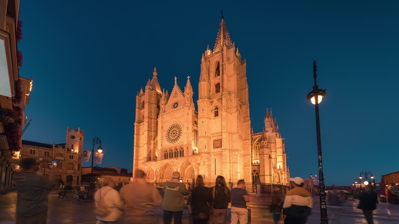 Timelapse of Leon Cathedral during a summer sunset day to night famous landmark gothic city square LEON letters sign