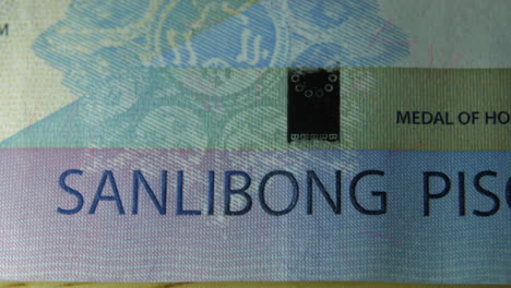 this is the macro view of a normal paper bank not- money- currency of 1000 philippines piso bill