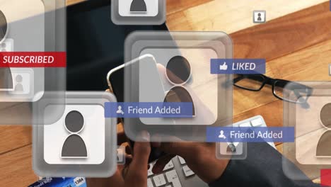 animation of falling social media icons over person using smartphone