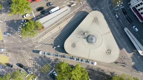 ascending shot reveals busy intersection in the heart of downtown zurich