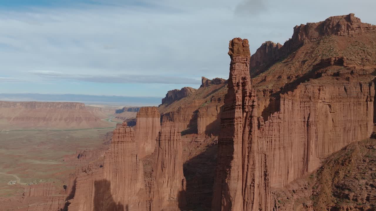 Stunning red rock formations under clear skies in Moab, Utah, feeling serene