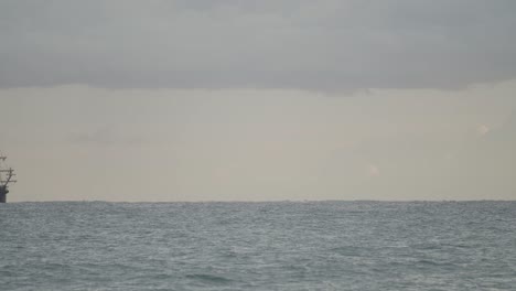 16th century galleon andalucia replica ship sailing in the mediterranean sea in a beautiful cloudy day at sunrise