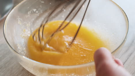 mixing eggs and sugar