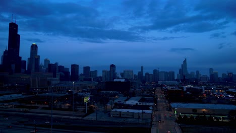 dramatic evening sky chicago downtown skyline drone