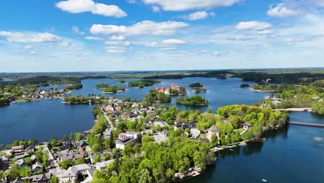 trakai township with island castle in background, aerial view