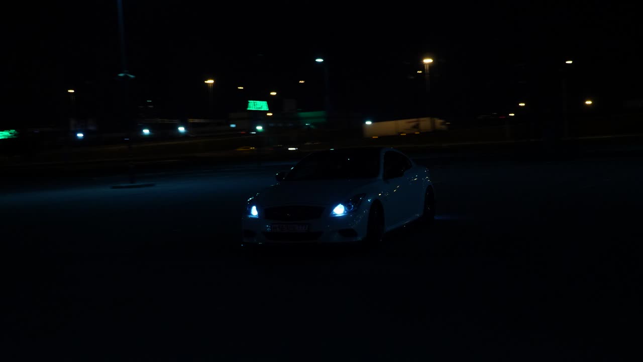 Car in a parking lot at night