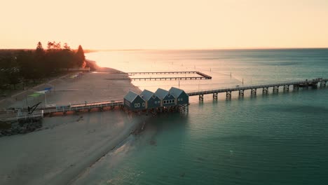 drone shot over busselton in western australia and the longuest jetty in the southern hemisphere at sunset