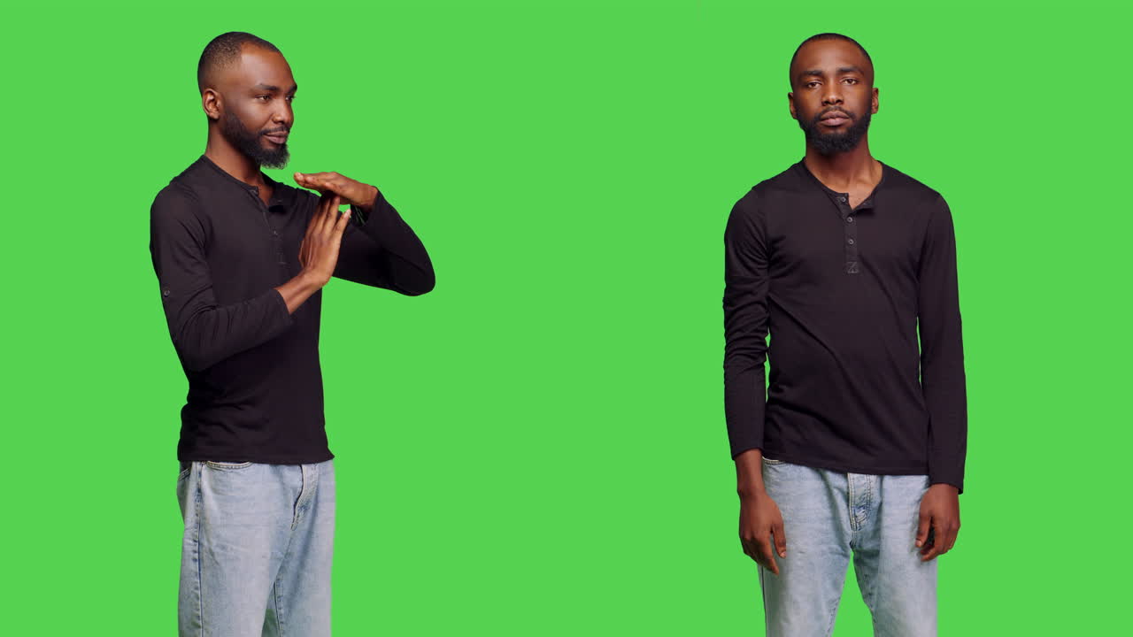 Man making timeout gesture