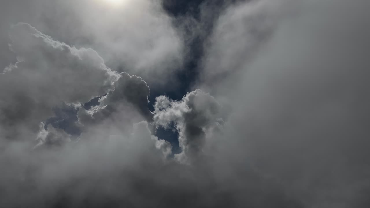 Drone flying in the middle of the clouds. Birds eye view