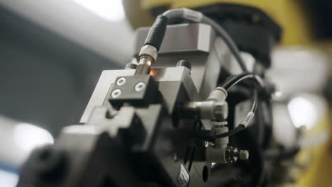 Close-up-of-the-parts-and-wires-that-make-a-automated-robot-arm-for-industrial-production