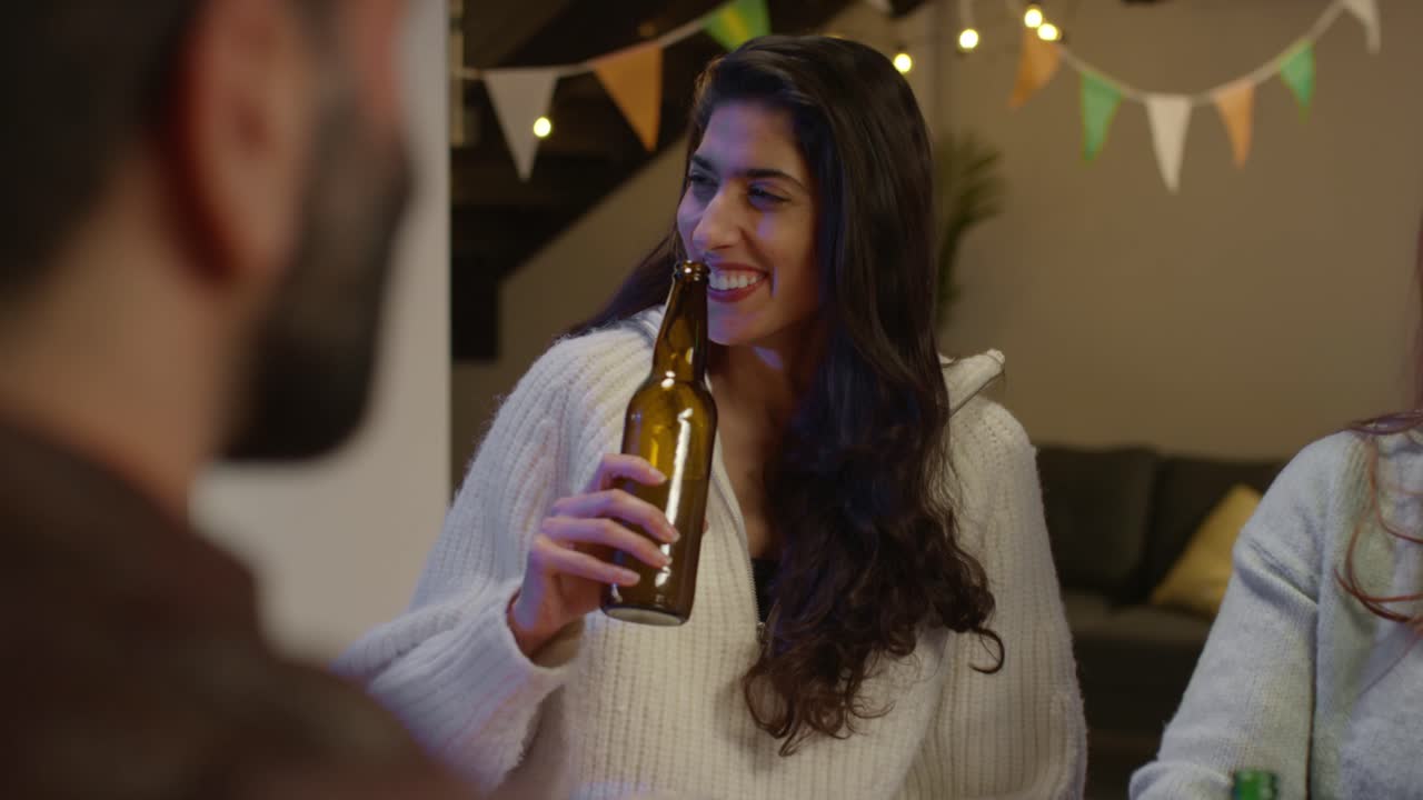 Group Of Friends At Home Or In Bar Celebrating At St Patrick's Day Party Drinking Alcohol Together 5