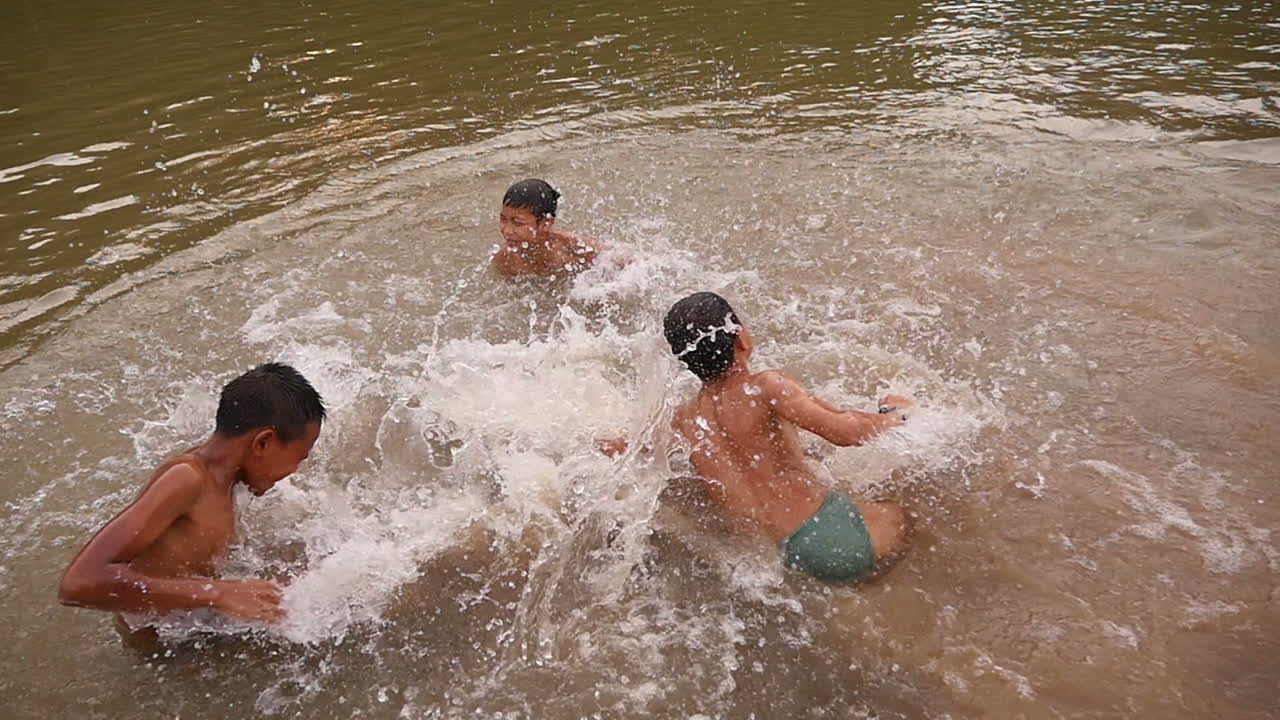 Children Playing in a River