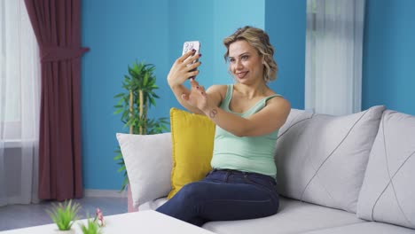 Fun-guy-taking-selfie-at-home.-Happy-and-relaxed.