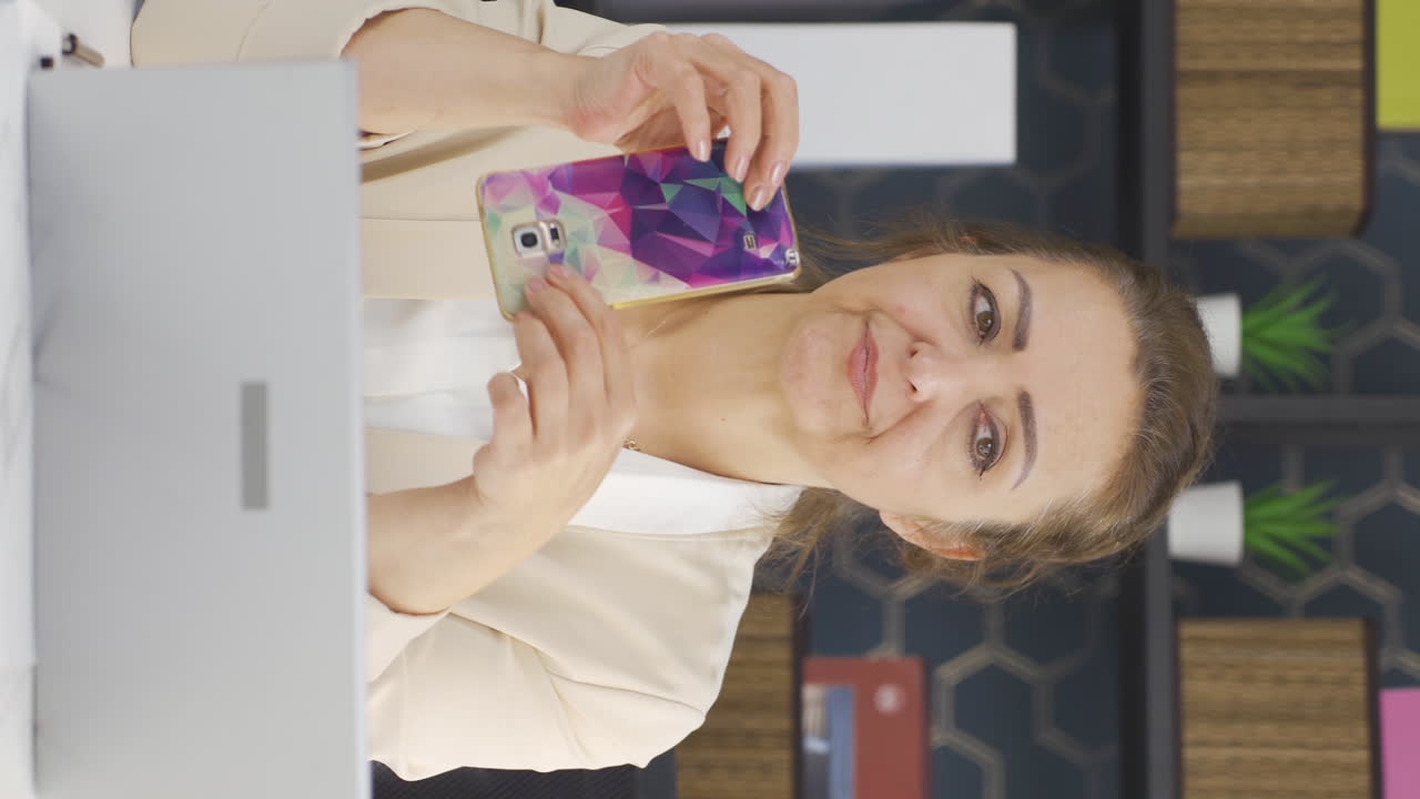 Vertical video of Stressed business woman is thinking.