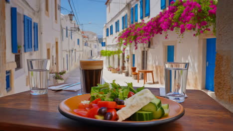mediterranean lunch on a charming street in a greek village