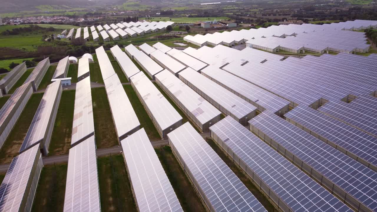 Photovoltaic solar power station greenhouse, vast renewable energy field, aerial