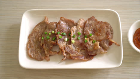 grilled-pork-neck-sliced-on-plate-in-Asian-style