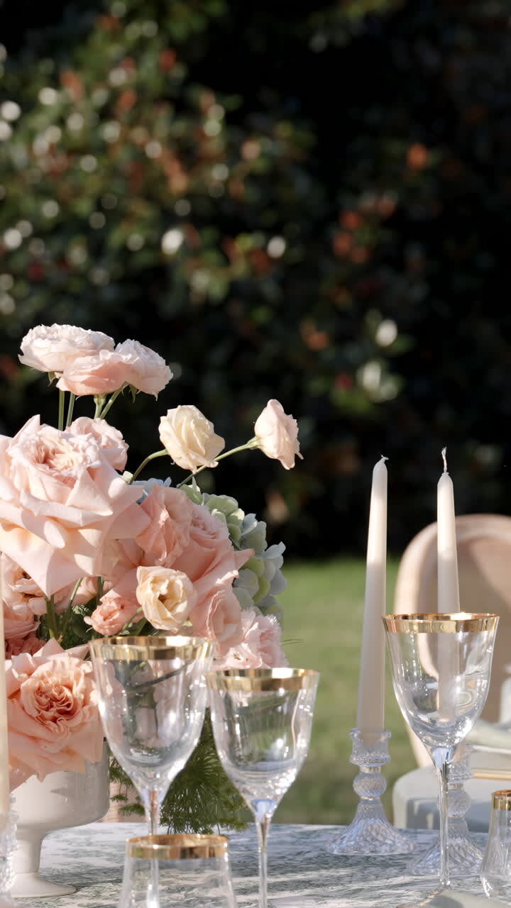 Elegant table setting with roses and candles