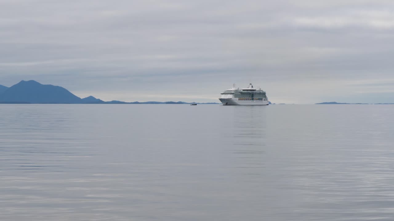 Cruise ship sailing slowly to Sitka, Alaska, United States of America. Alaskan summer cruises season.