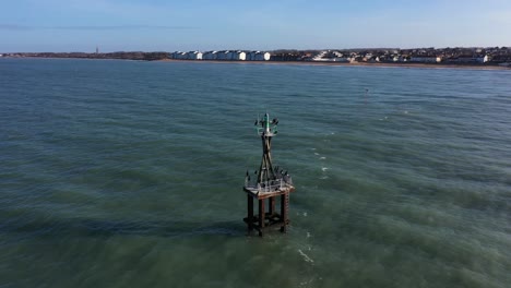 aerial shot of a marin beacon in couseulles sur mer