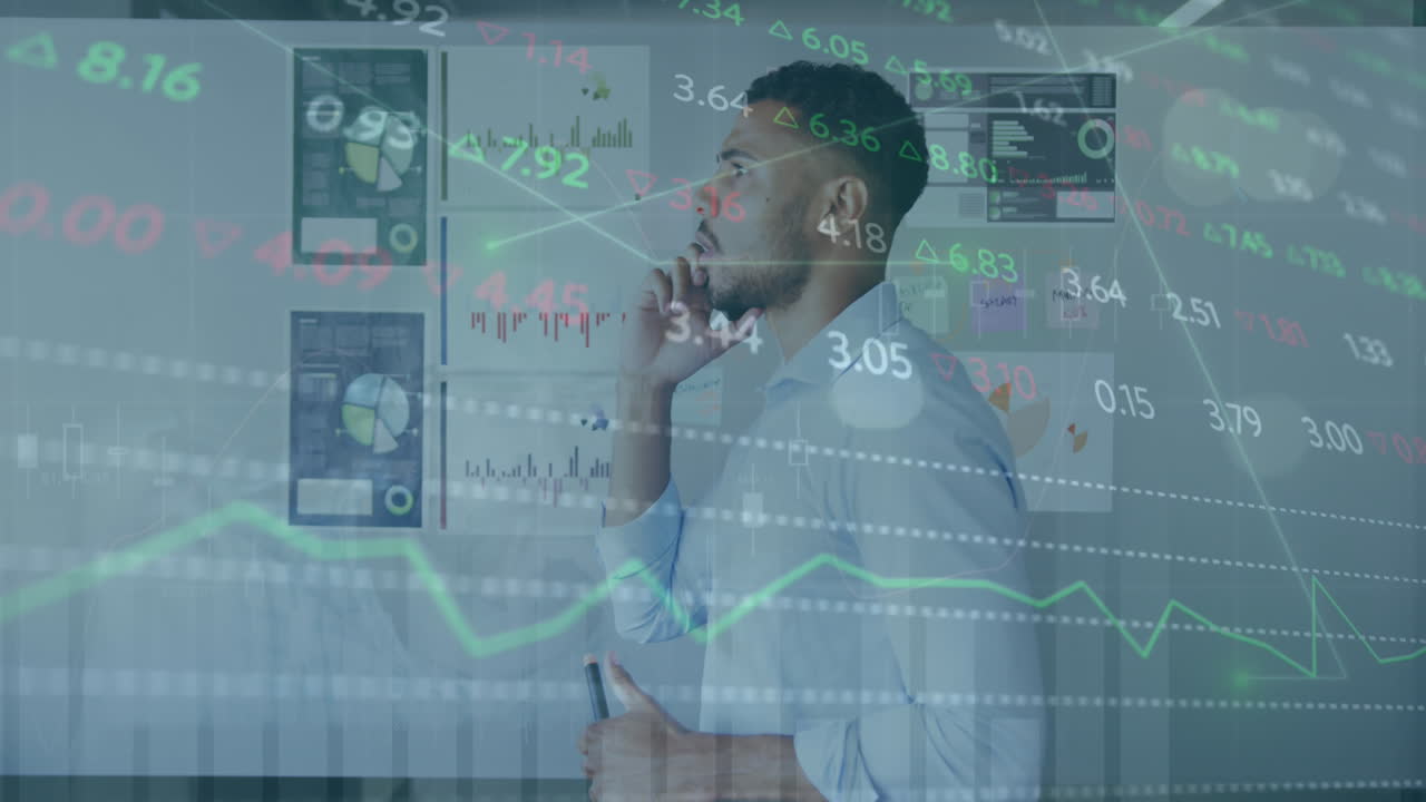Animation of trading board over biracial man looking at reports while talking on smartphone