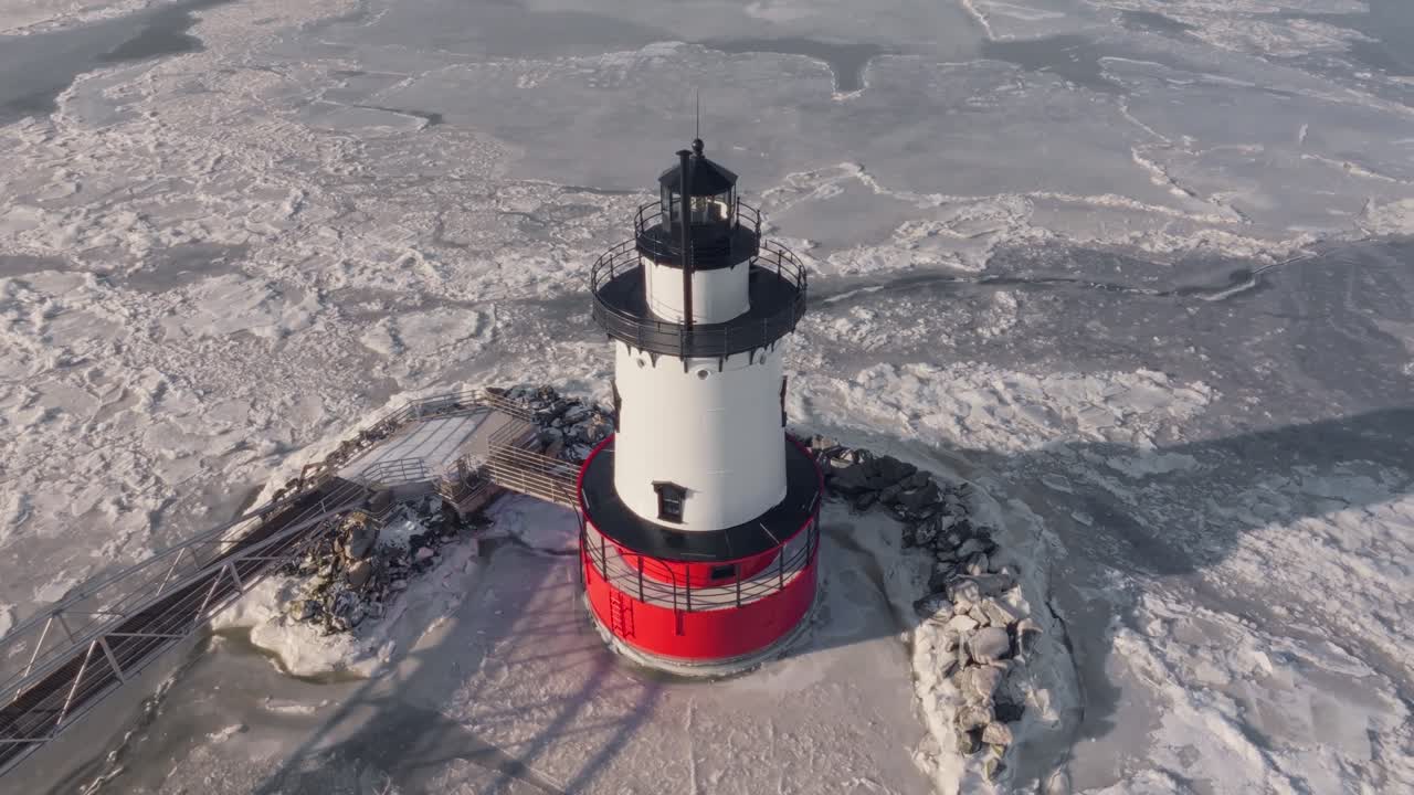 Circling overhead the Sleepy Hollow Lighthouse along the icy banks of the Hudson River.