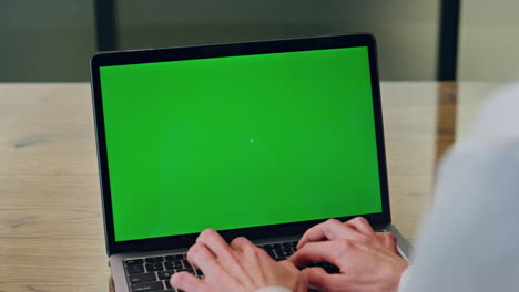 Woman-hands-typing-mockup-laptop-in-office-closeup.-Unknown-lady-pushing-buttons