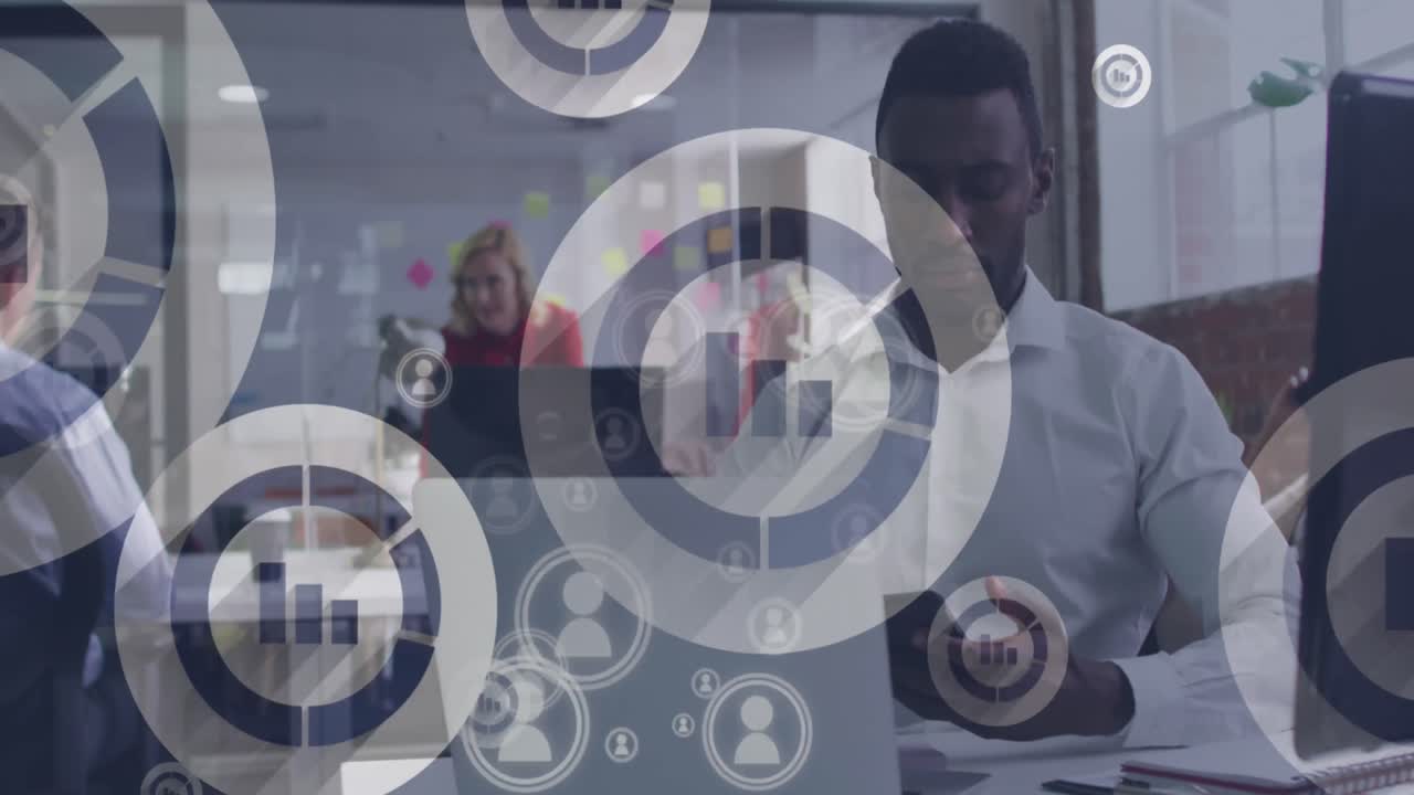 Animation of people and data icons african american businessman using phone and laptop in office