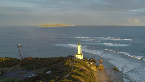 aerial view at sunset over the point lonsdale lighthouse, and port philip bay heads towards point nepean