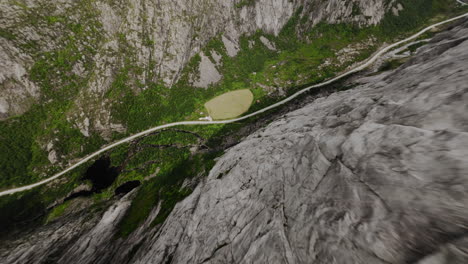 Drone-Dive-From-Mountain-Down-To-Valley-In-Norway