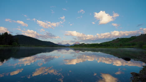 grand teton mountains and sky reflected in oxbow bend