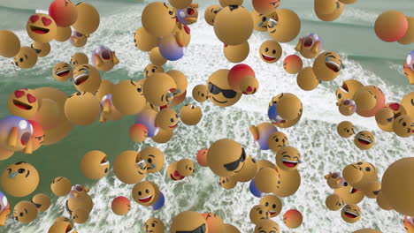 digital composition of multiple face emojis floating against aerial view waves in the sea