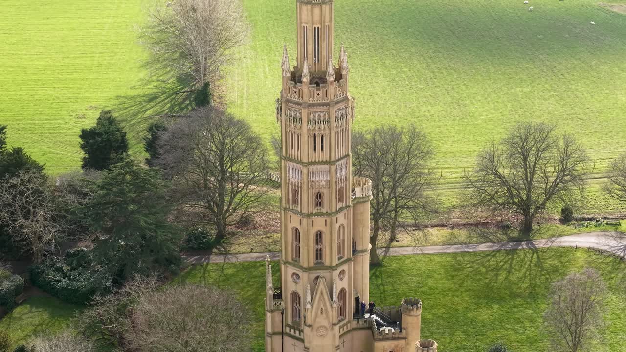 Architectural Victorian Gothic detail of Hadlow Tower in Kent English countryside, aerial view