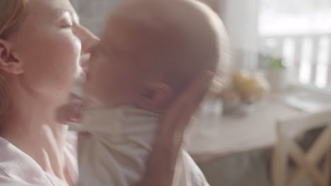 mother and baby in kitchen