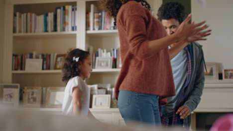 cute-little-girl-dancing-with-mother-at-home-family-having-fun-parents-mom-and-dad-playing-with-daughter-at-home-on-weekend-4k